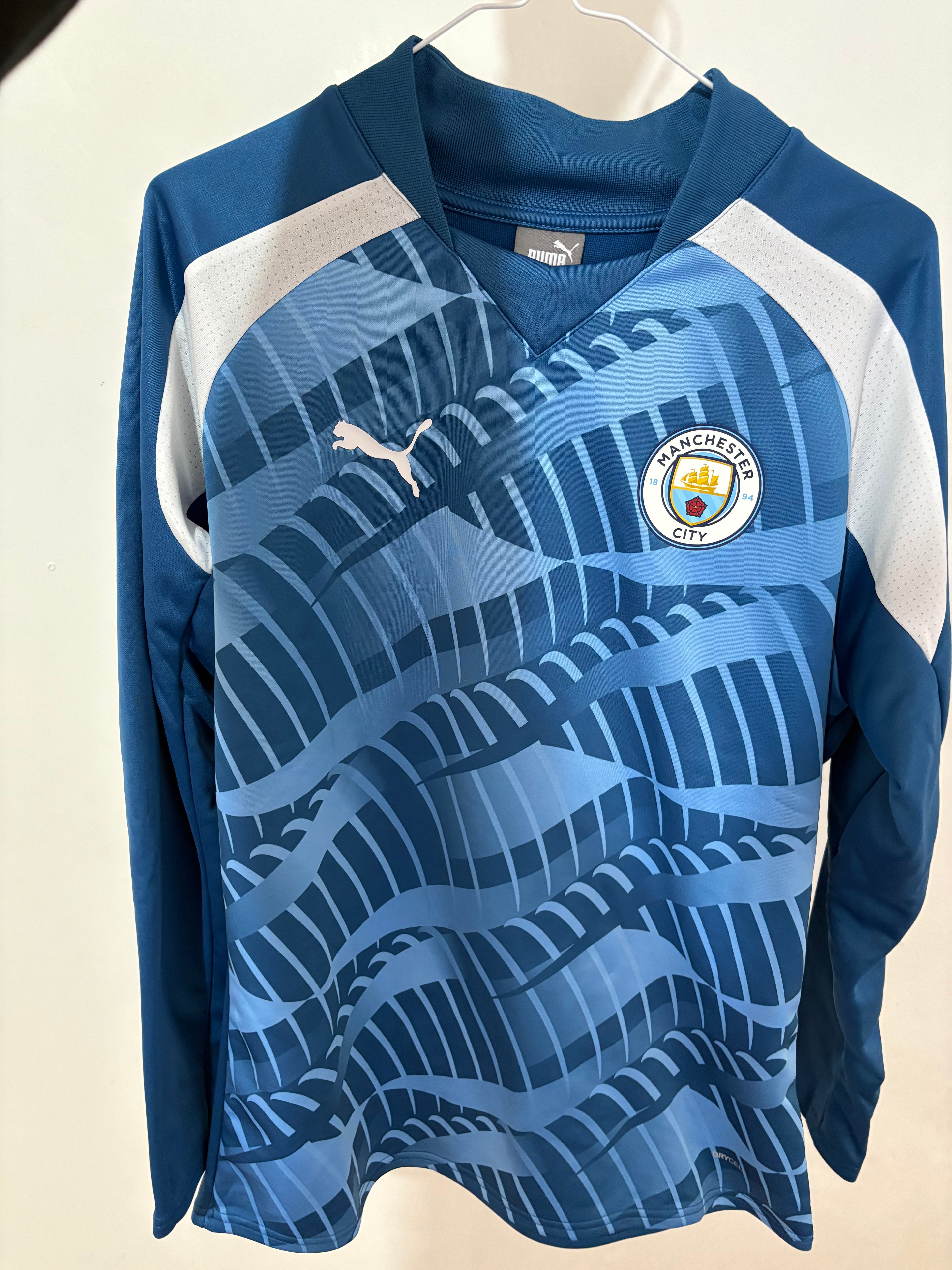 Sudadera prematch Manchester City
