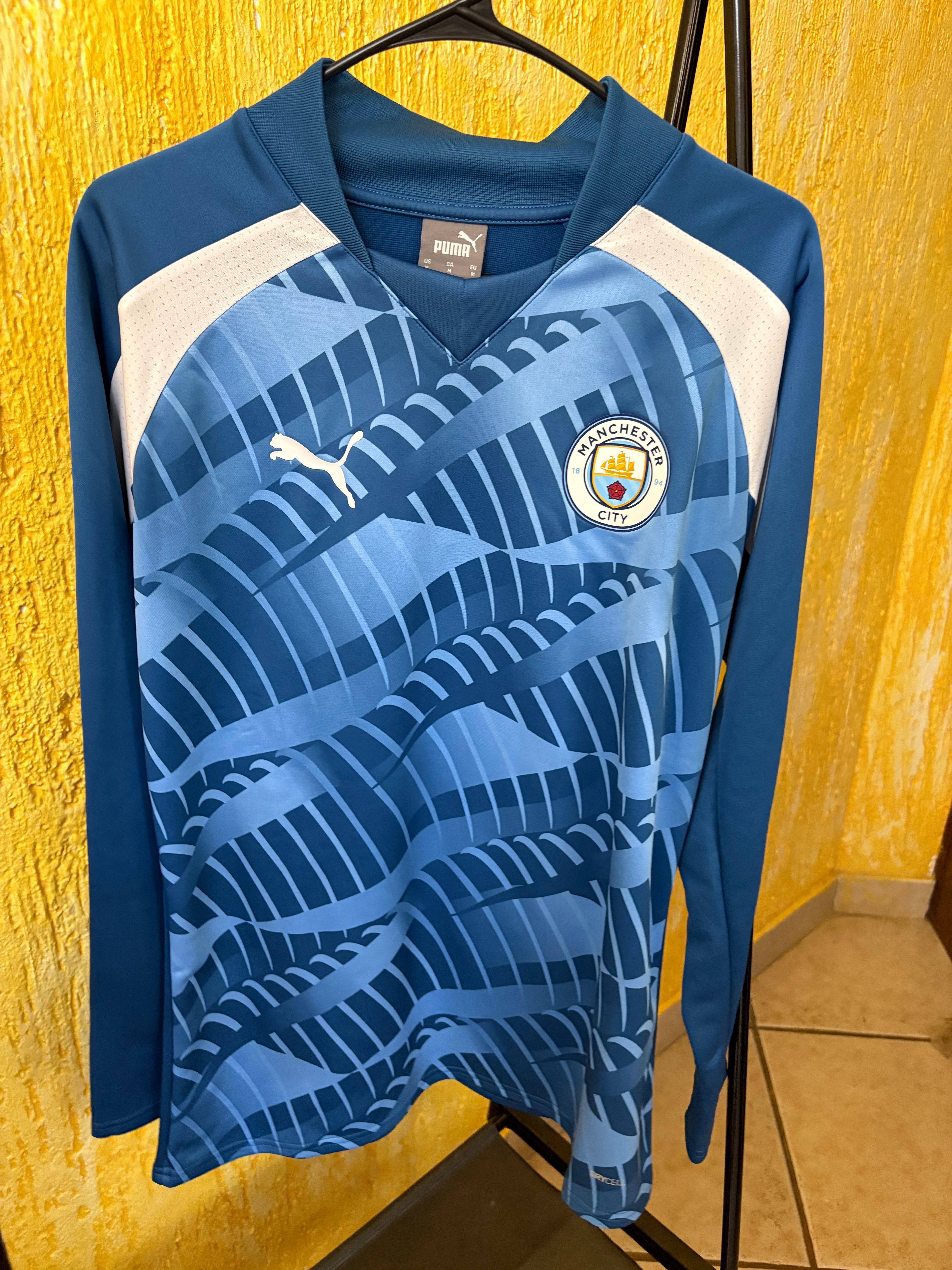 Sudadera prematch Manchester City
